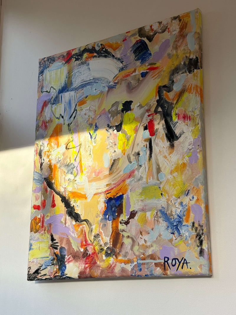 Abstract painting with vibrant colors on a white wall, signed 'ROYA'.